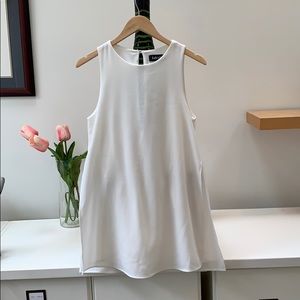 White Romper with overlay with slit on each side